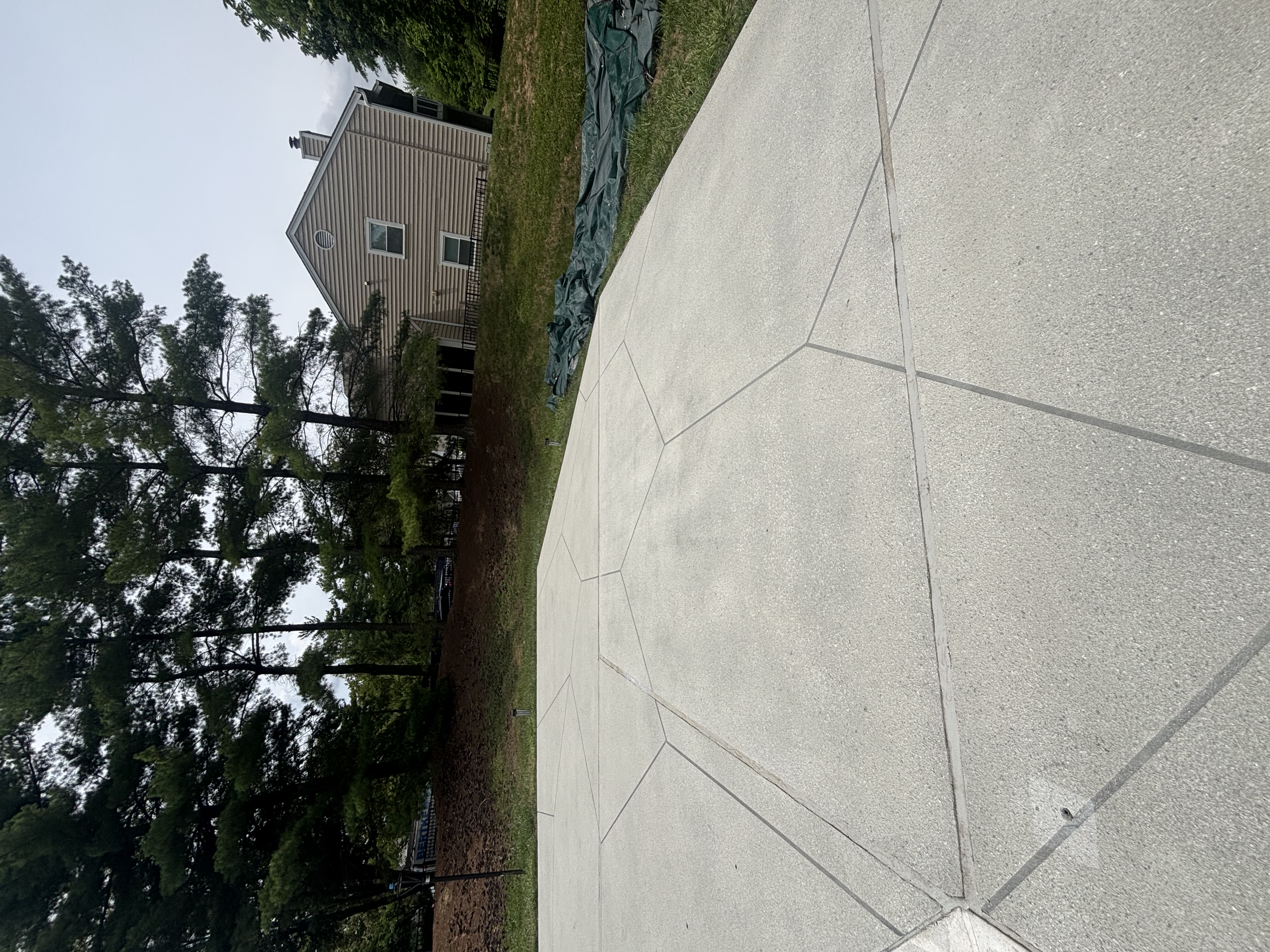 Resurfaced pool deck with decorative scoring pattern at a Maineville, OH home